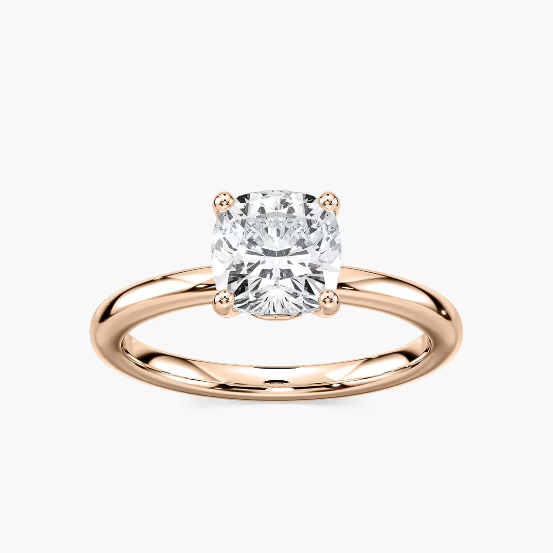 Delicate Four-Prong Cushion Cut Solitaire Engagement Ring