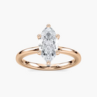 Delicate Four-Prong Marquise Cut Solitaire Engagement Ring