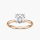 Delicate Four-Prong Round Cut Solitaire Engagement Ring