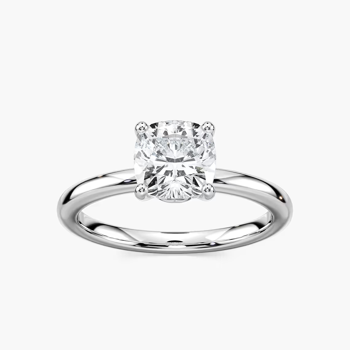 Delicate Four-Prong Cushion Cut Solitaire Engagement Ring