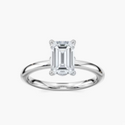Delicate Four-Prong Emerald Cut Solitaire Engagement Ring