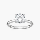Delicate Four-Prong Round Cut Solitaire Engagement Ring