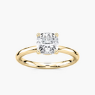 Delicate Four-Prong Cushion Cut Solitaire Engagement Ring