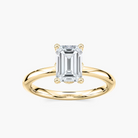 Delicate Four-Prong Emerald Cut Solitaire Engagement Ring