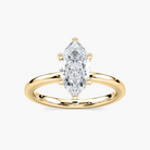 Delicate Four-Prong Marquise Cut Solitaire Engagement Ring