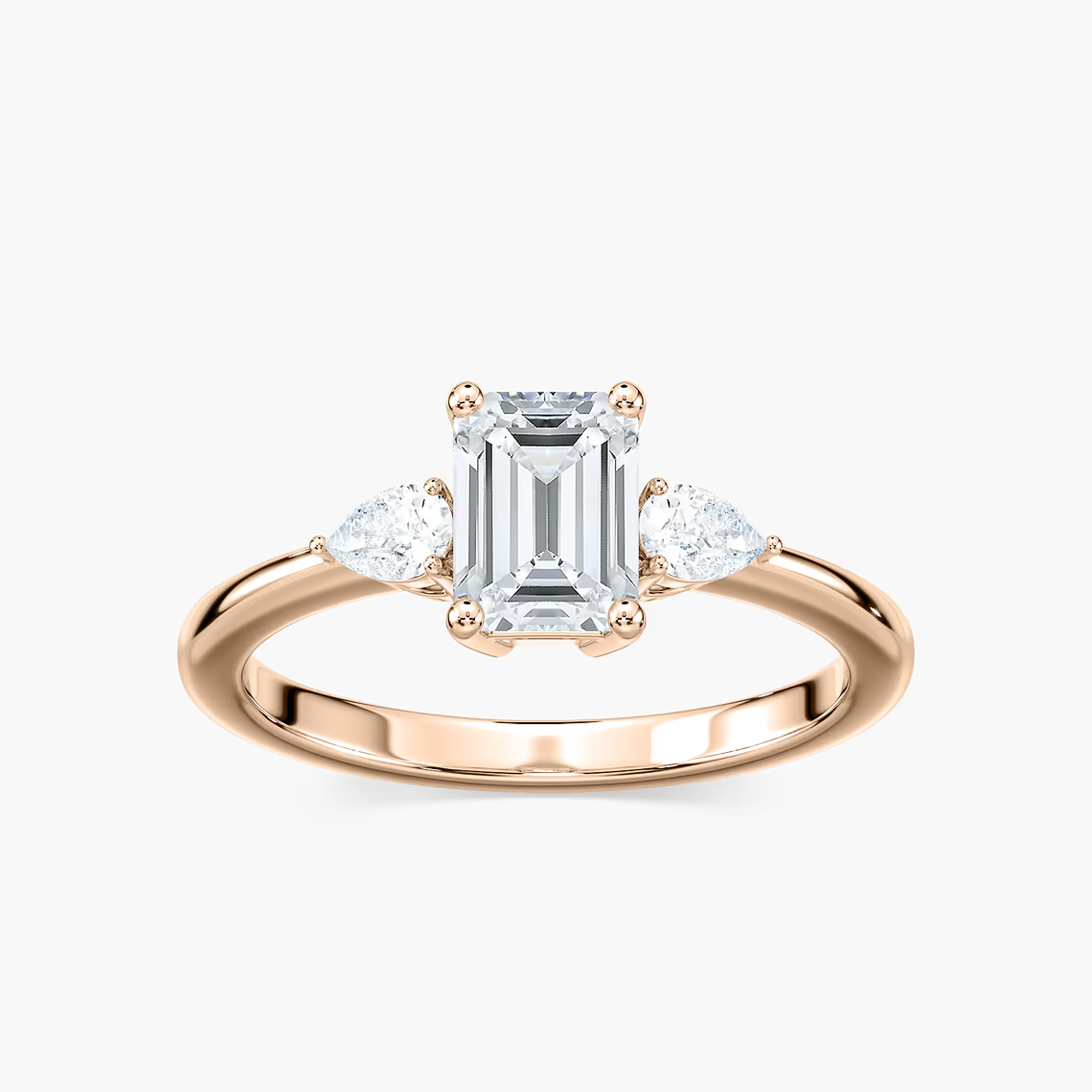 Emerald Cut Three Stone Engagement Ring