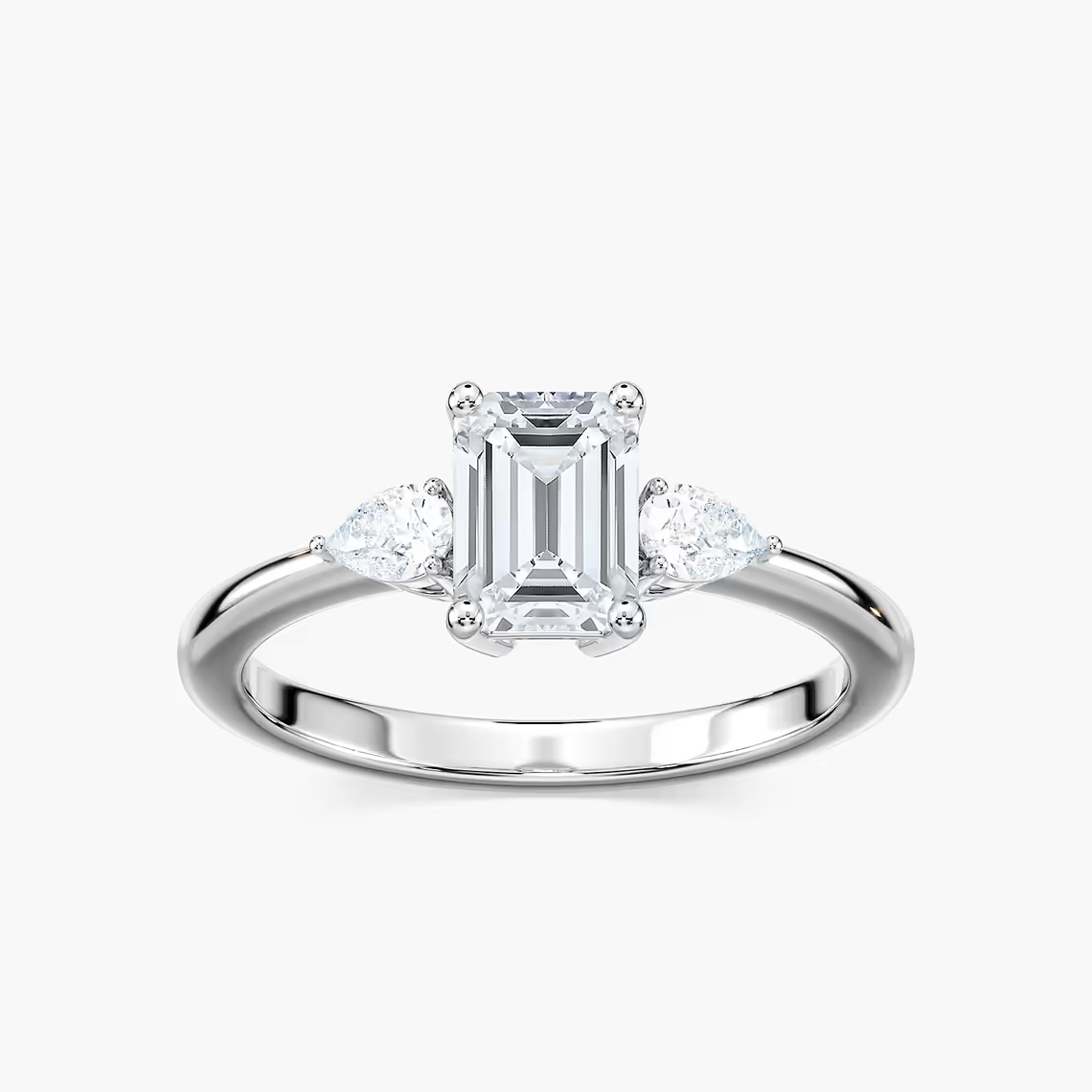 Emerald Cut Three Stone Engagement Ring