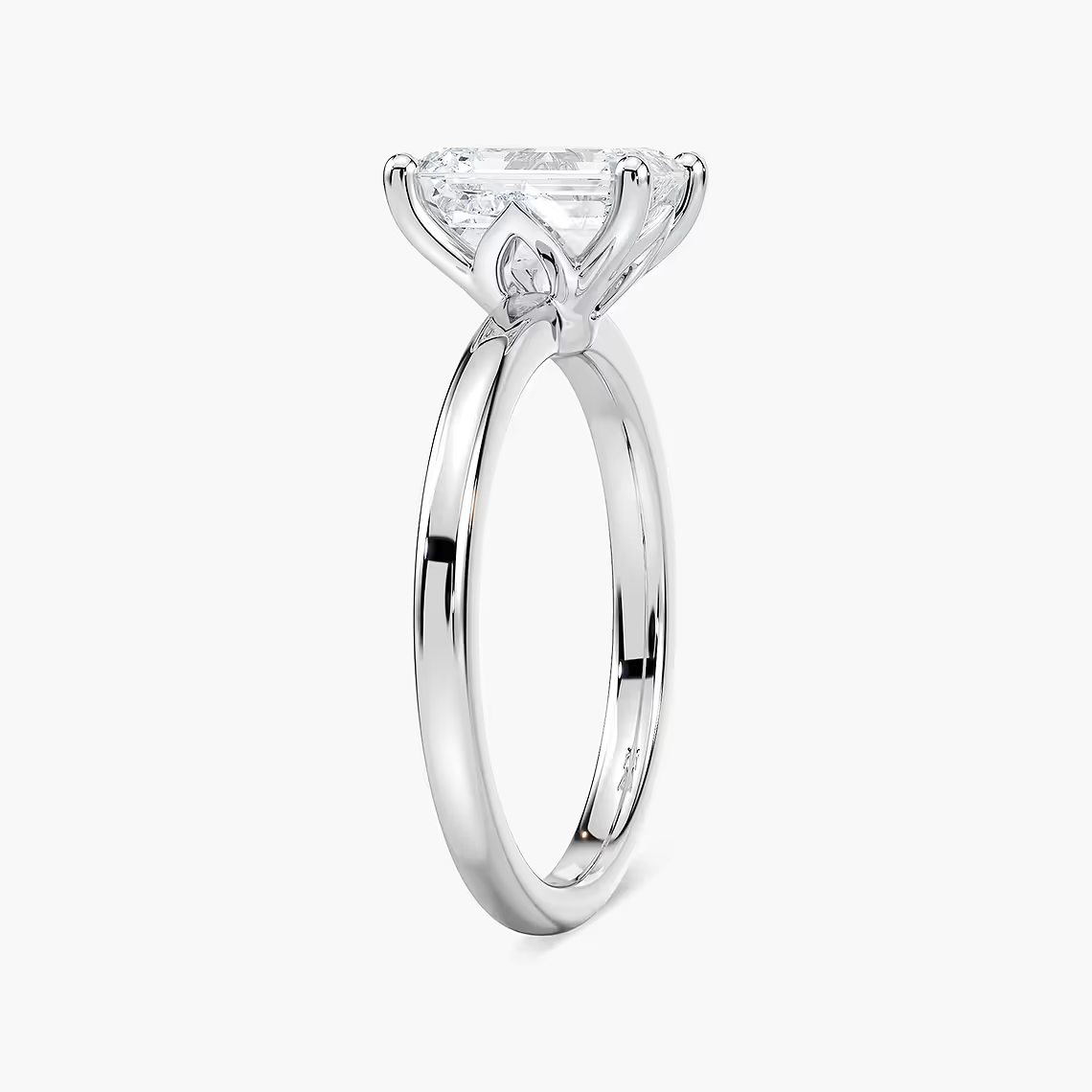 Delicate Four-Prong Emerald Cut Solitaire Engagement Ring