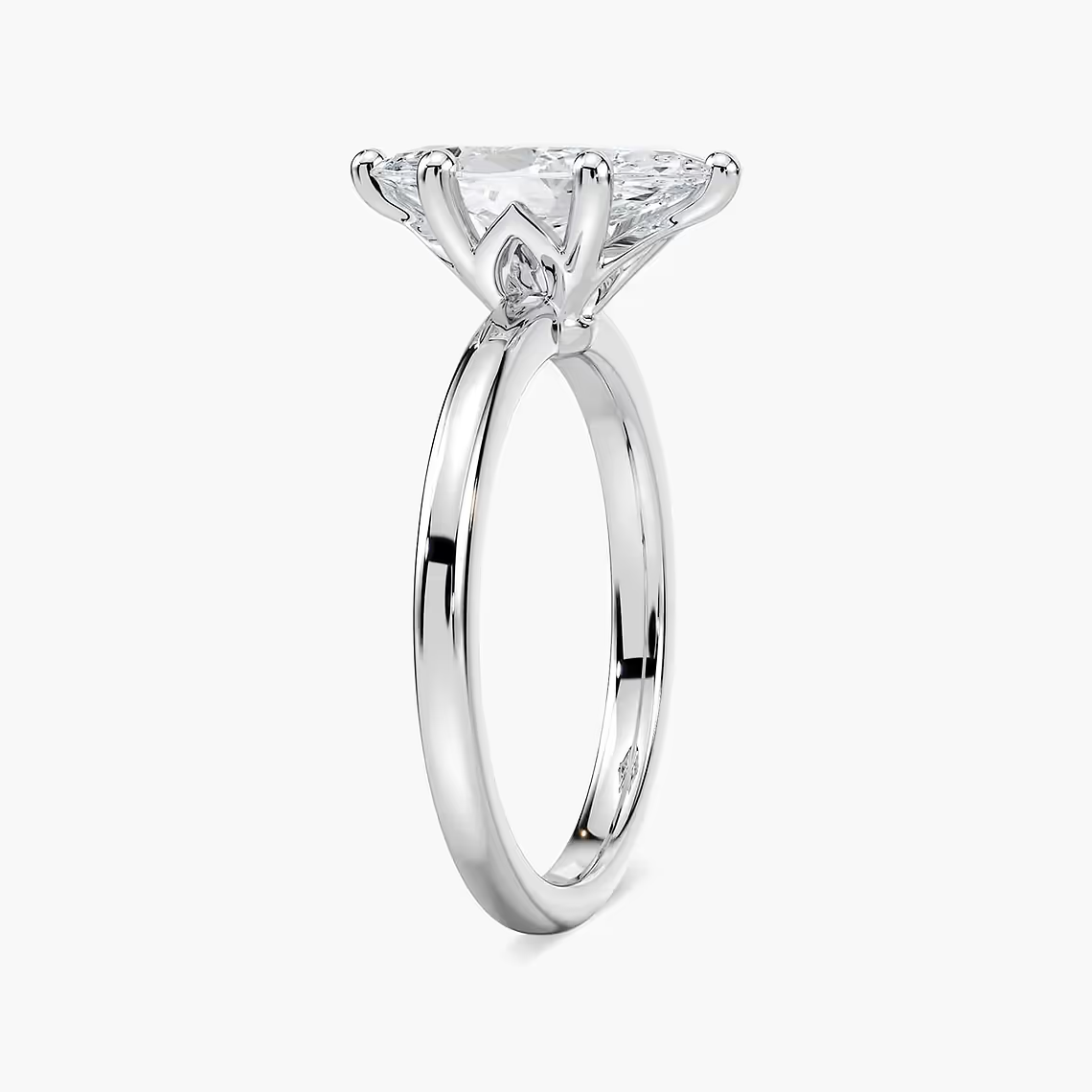 Delicate Four-Prong Marquise Cut Solitaire Engagement Ring