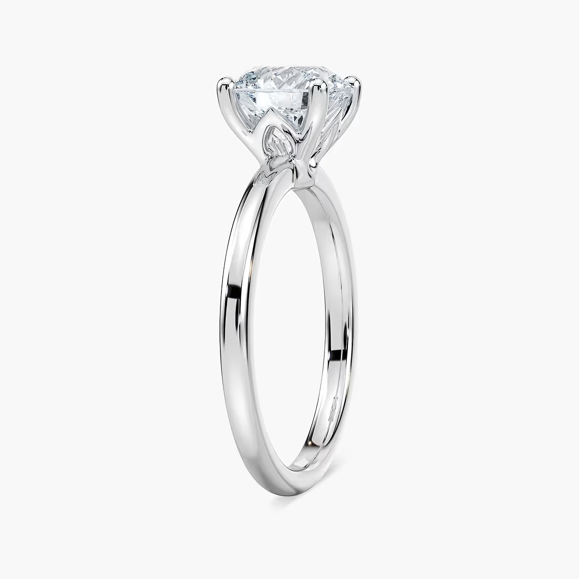 Delicate Four-Prong Round Cut Solitaire Engagement Ring