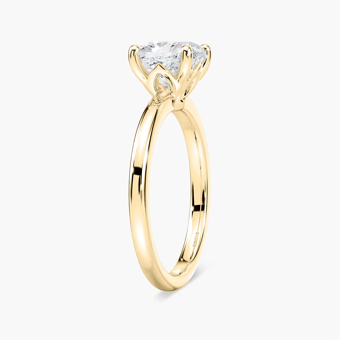Delicate Four-Prong Cushion Cut Solitaire Engagement Ring