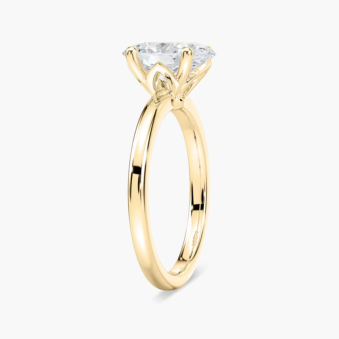 Delicate Four-Prong Oval Solitaire Engagement Ring