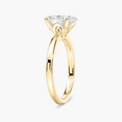 Delicate Four-Prong Oval Solitaire Engagement Ring