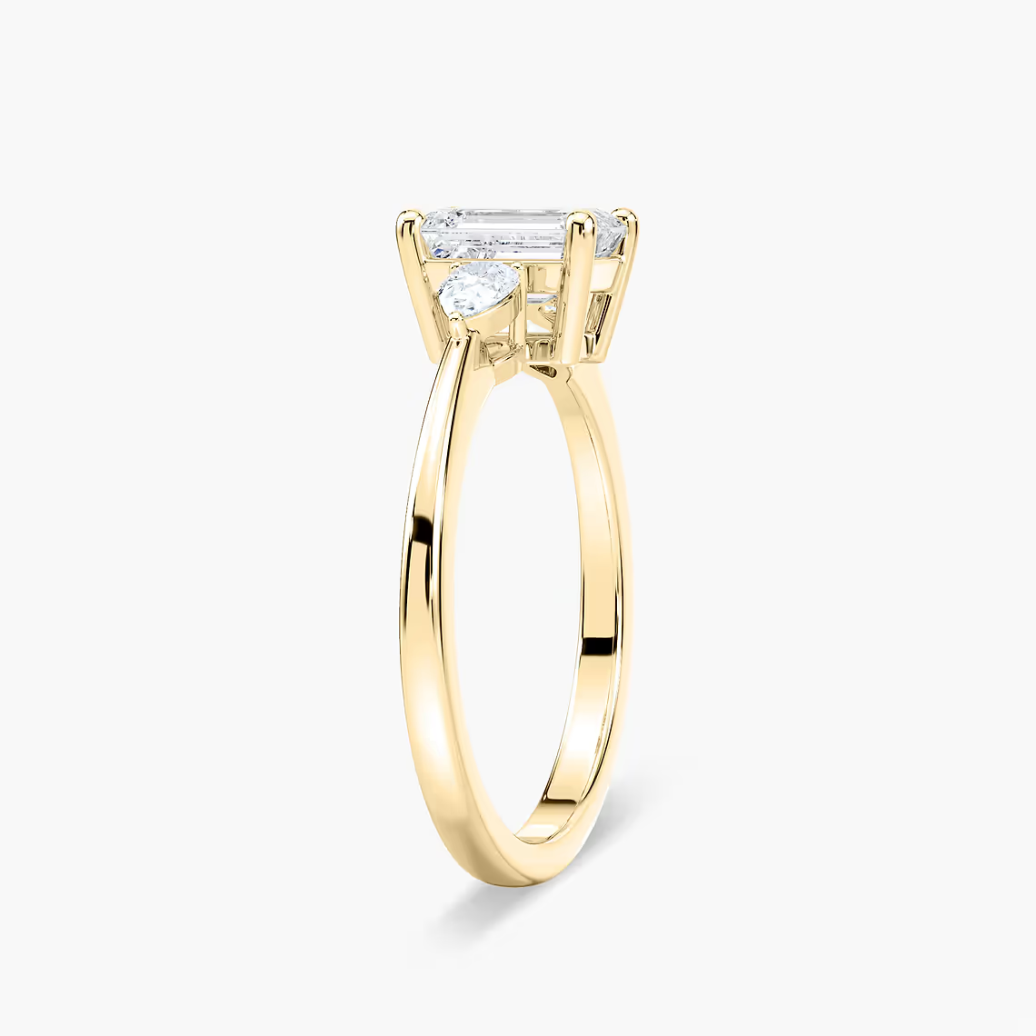 Emerald Cut Three Stone Engagement Ring