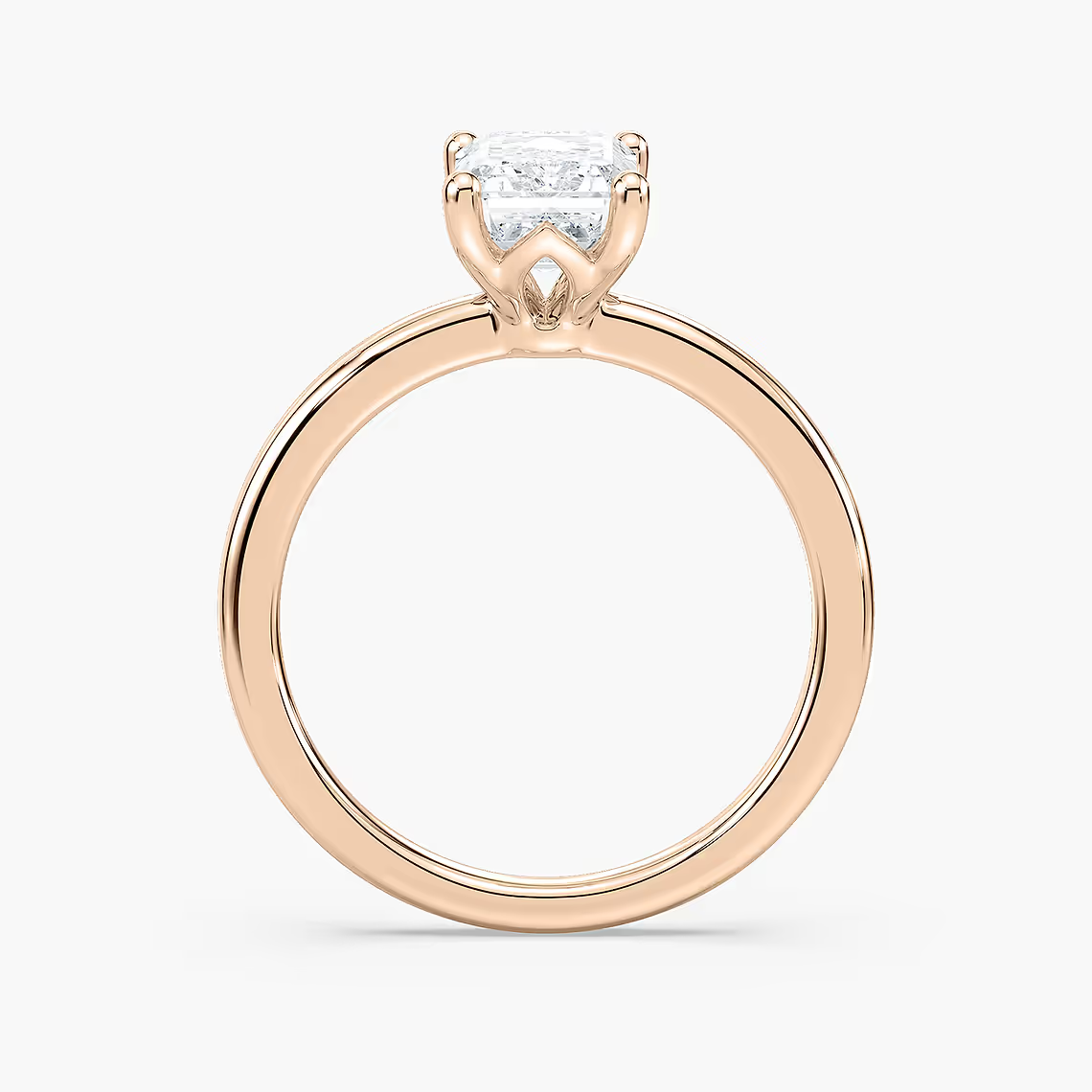 Delicate Four-Prong Emerald Cut Solitaire Engagement Ring