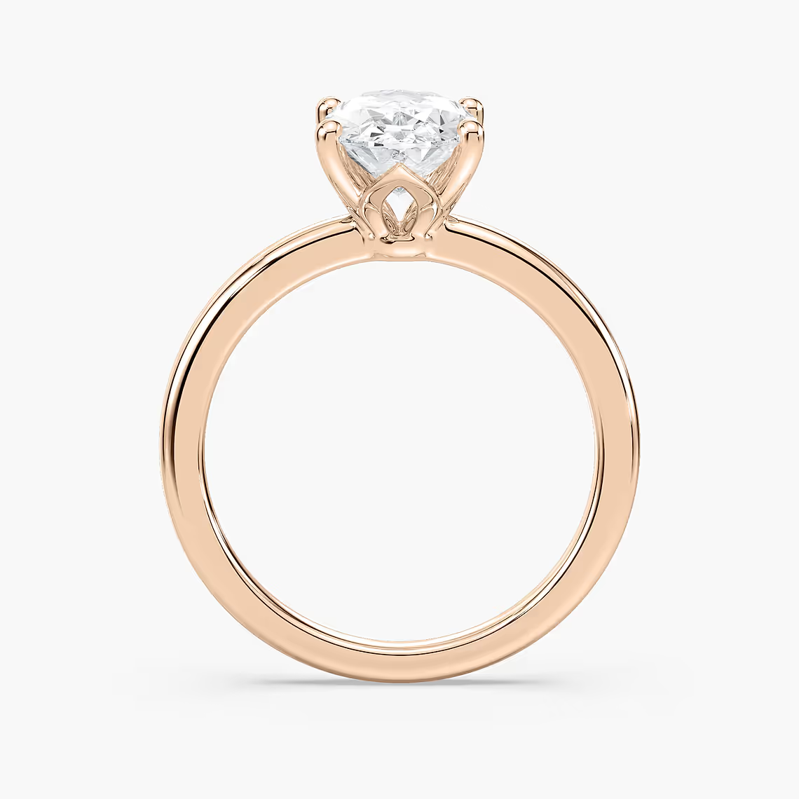 Delicate Four-Prong Oval Solitaire Engagement Ring