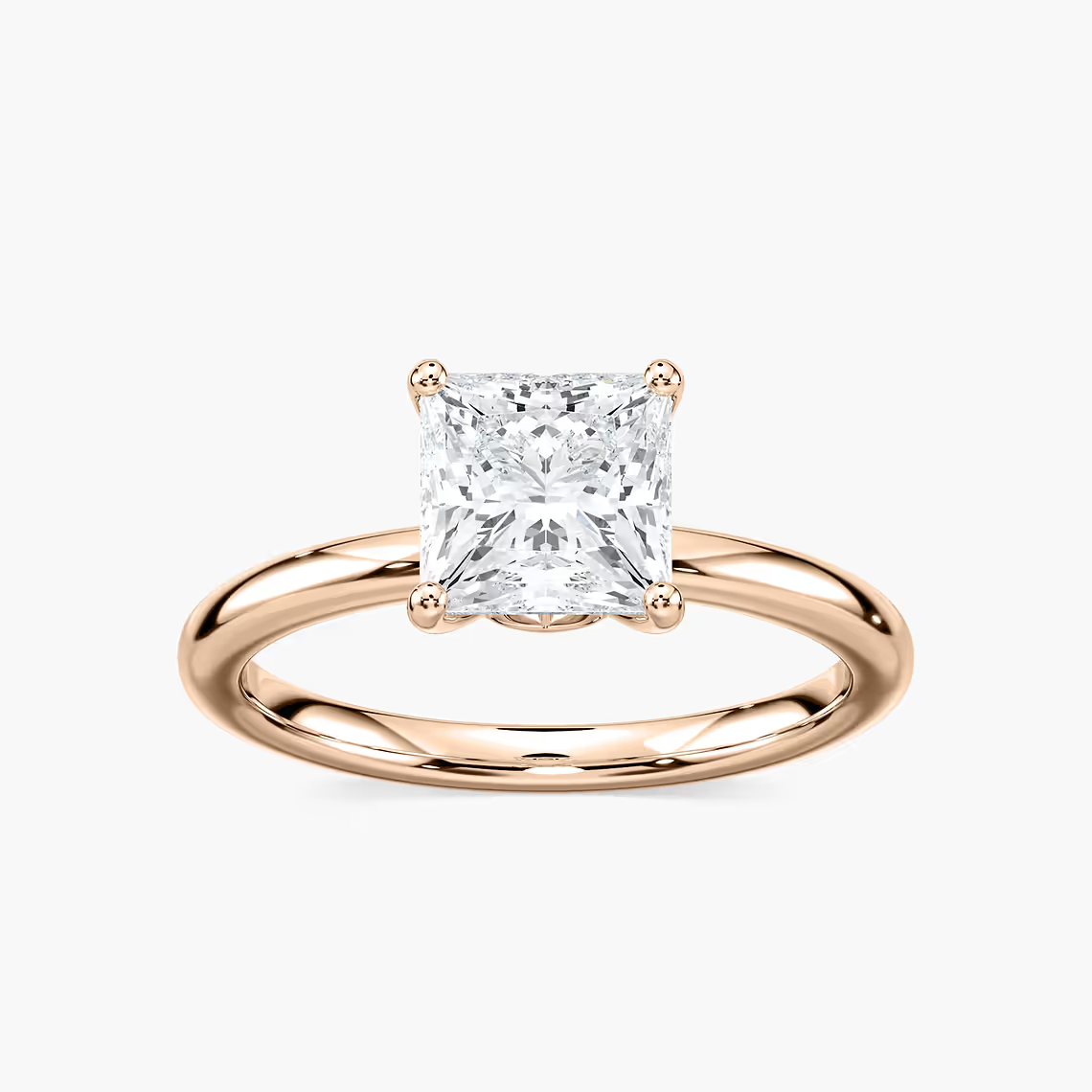 Delicate Four-Prong Princess Cut Solitaire Engagement Ring