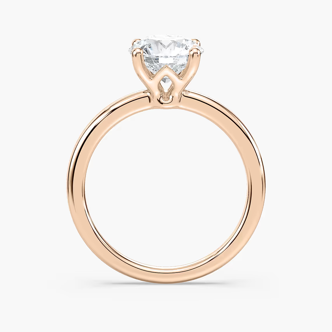 Delicate Four-Prong Round Cut Solitaire Engagement Ring