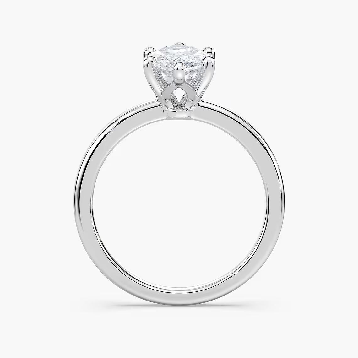 Delicate Four-Prong Marquise Cut Solitaire Engagement Ring