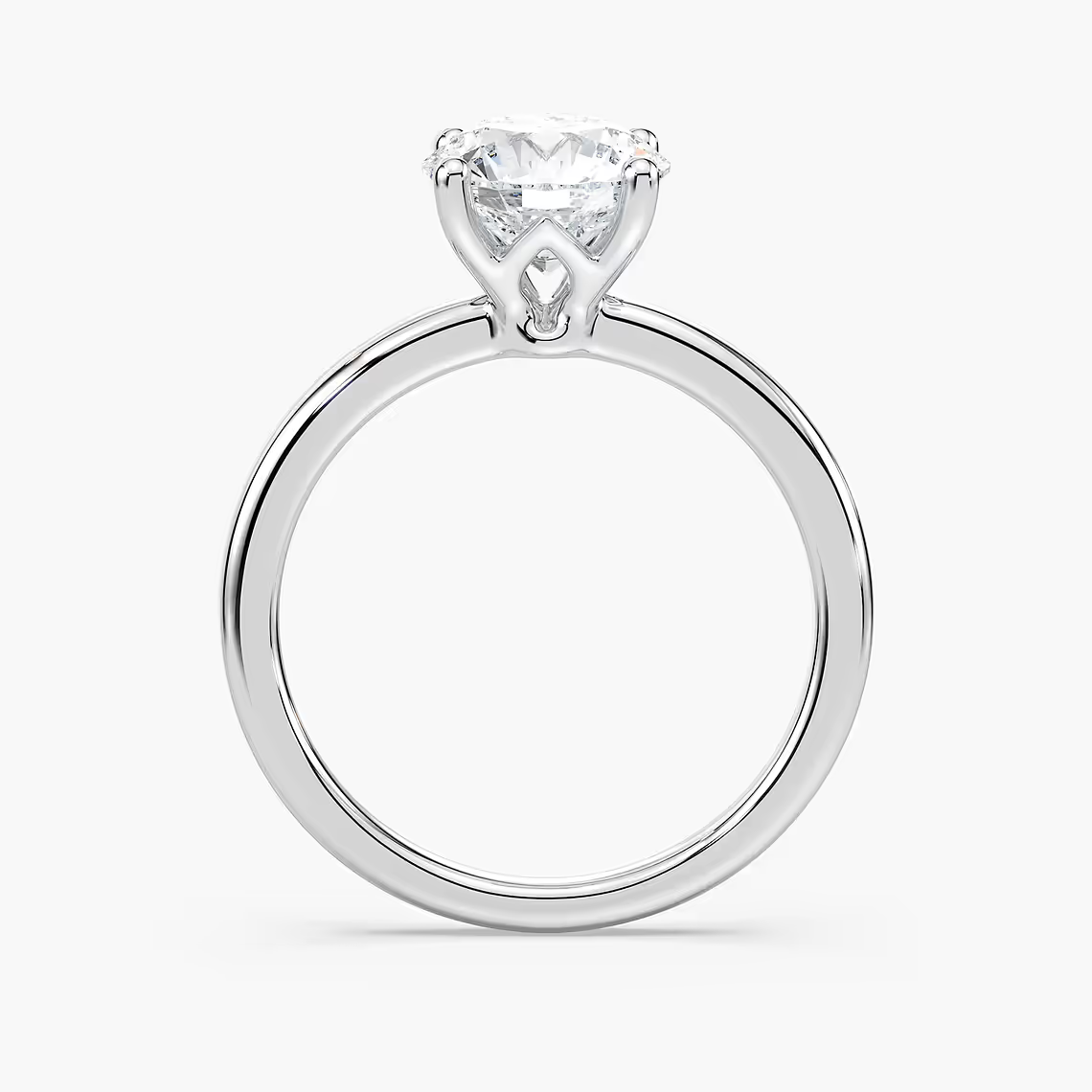 Delicate Four-Prong Round Cut Solitaire Engagement Ring
