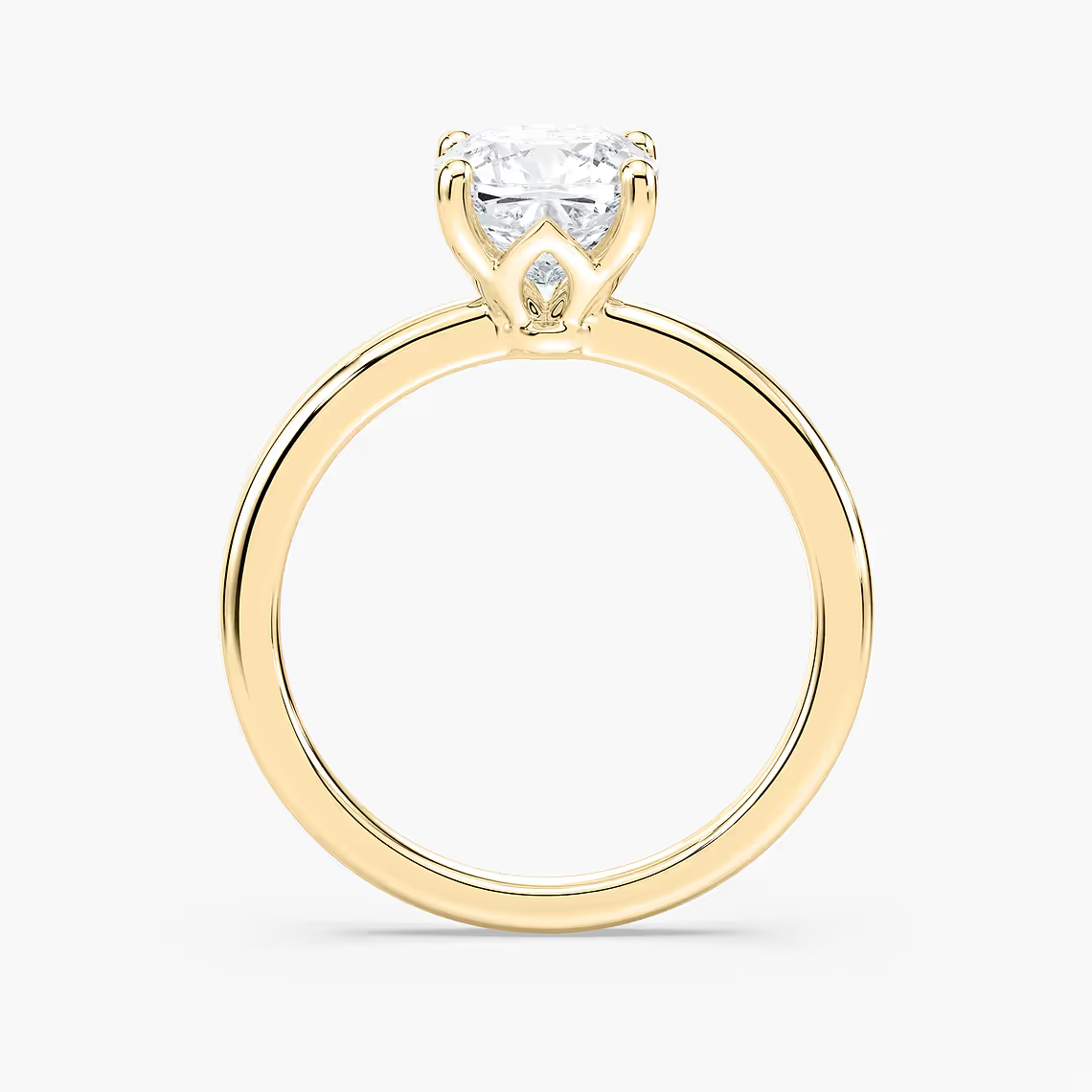 Delicate Four-Prong Cushion Cut Solitaire Engagement Ring