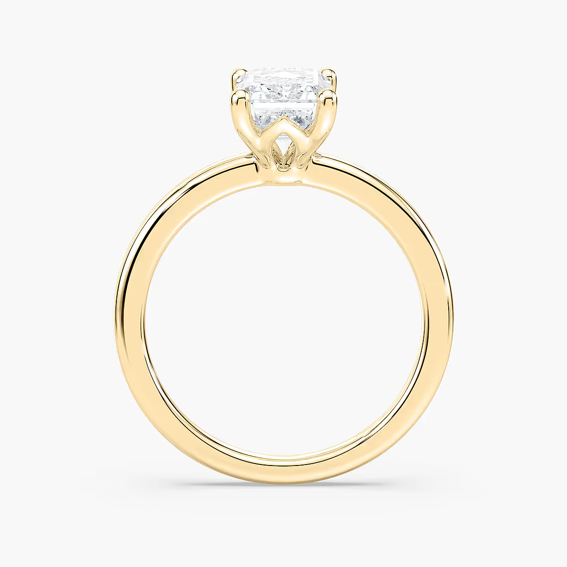 Delicate Four-Prong Emerald Cut Solitaire Engagement Ring