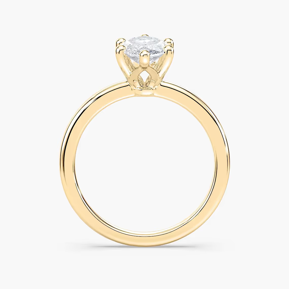 Delicate Four-Prong Marquise Cut Solitaire Engagement Ring