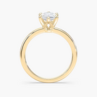 Delicate Four-Prong Marquise Cut Solitaire Engagement Ring