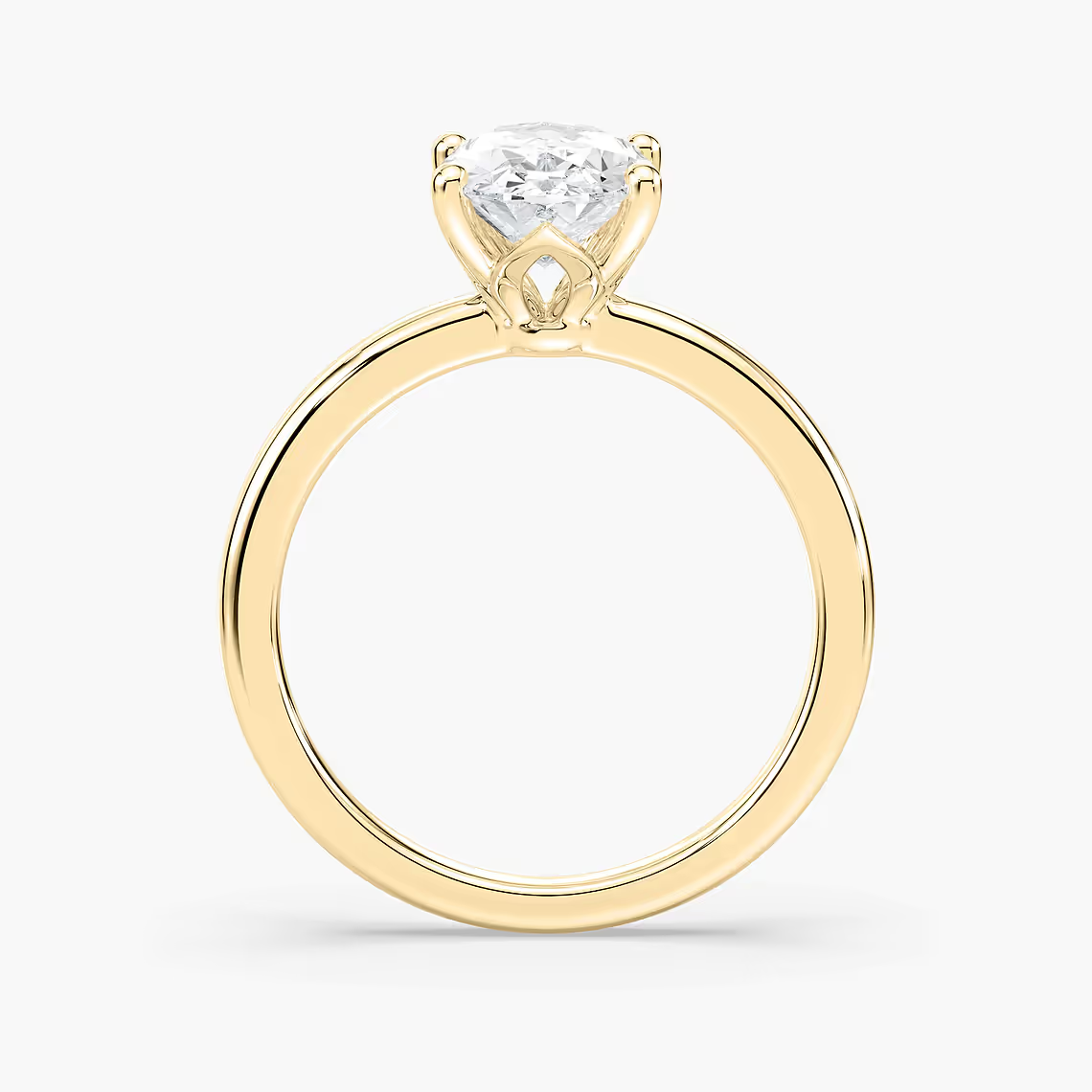 Delicate Four-Prong Oval Solitaire Engagement Ring