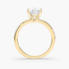 Delicate Four-Prong Oval Solitaire Engagement Ring