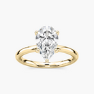Delicate Four-Prong Pear Shaped Solitaire Engagement Ring