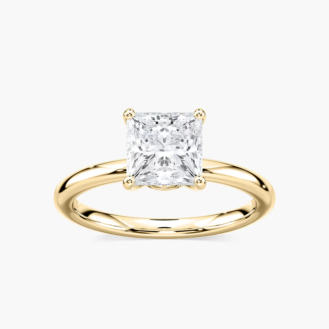 Delicate Four-Prong Princess Cut Solitaire Engagement Ring