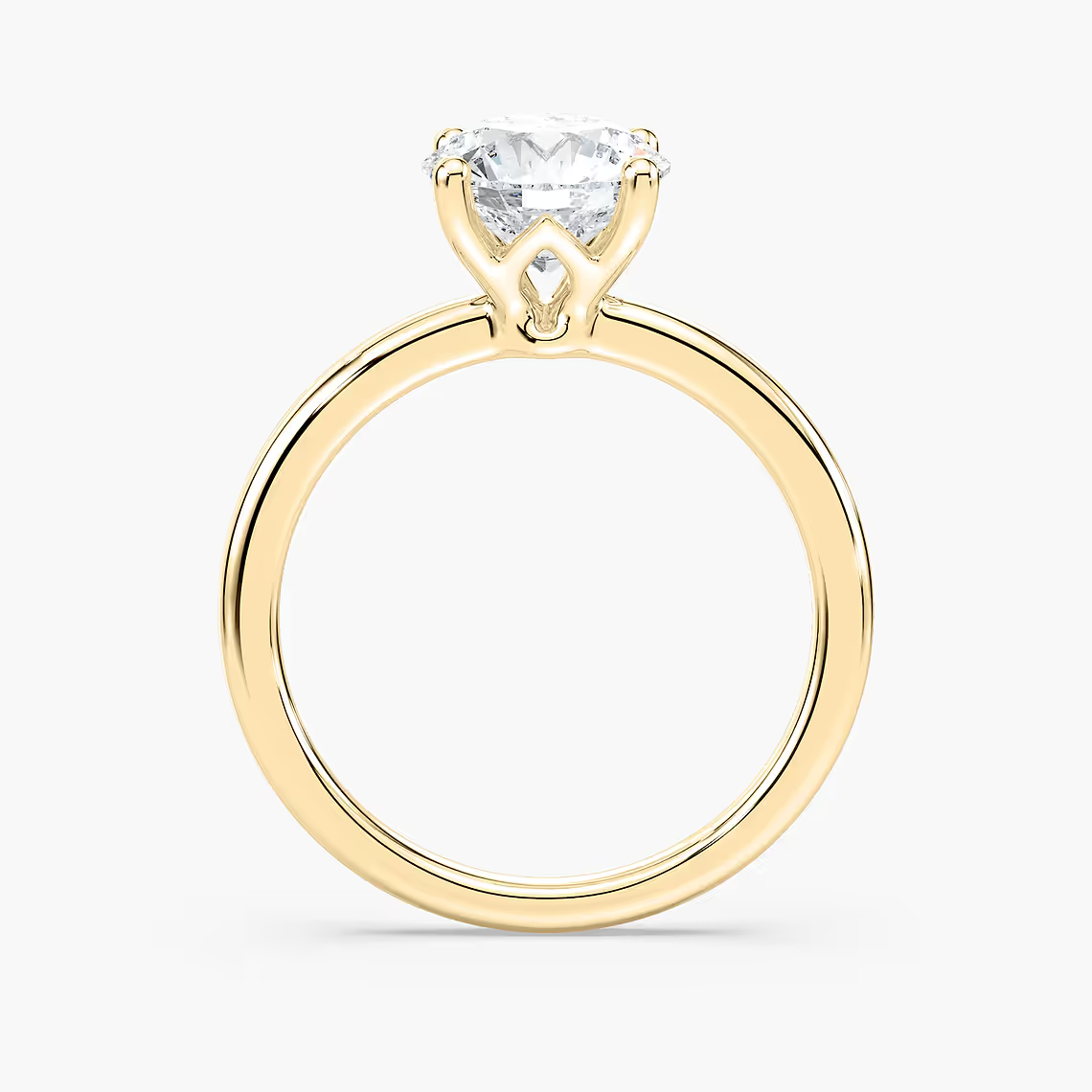 Delicate Four-Prong Round Cut Solitaire Engagement Ring