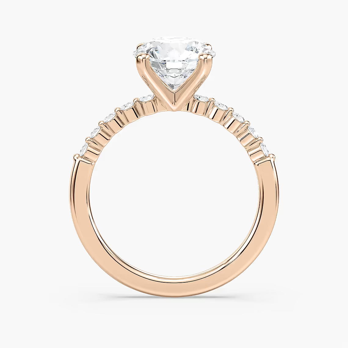 Round Cut Shared Prong Side Stone Engagement Ring