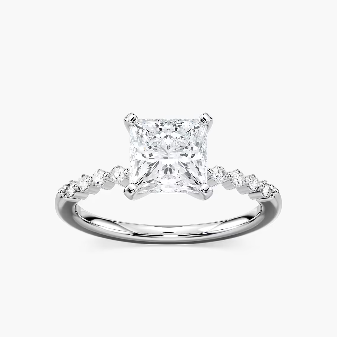 Princess Cut Shared Prong Side Stone Engagement Ring