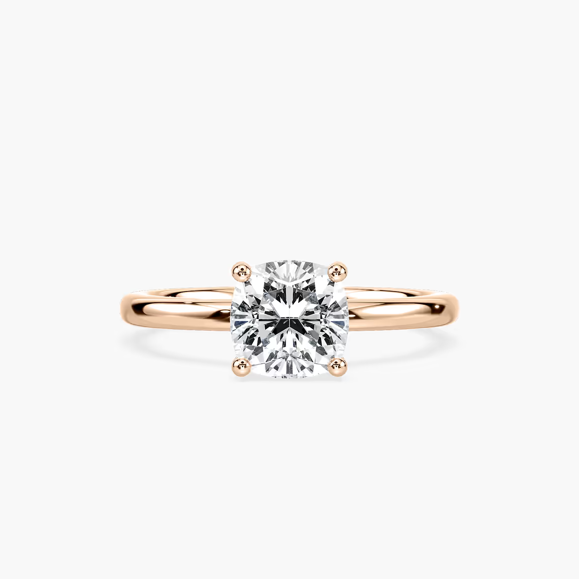 Delicate Four-Prong Cushion Cut Solitaire Engagement Ring