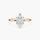 Delicate Four-Prong Marquise Cut Solitaire Engagement Ring