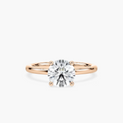 Delicate Four-Prong Round Cut Solitaire Engagement Ring