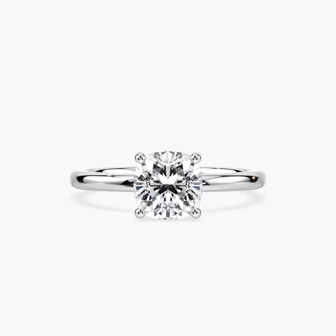 Delicate Four-Prong Cushion Cut Solitaire Engagement Ring