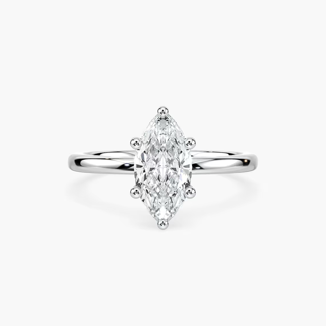 Delicate Four-Prong Marquise Cut Solitaire Engagement Ring