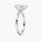 Delicate Four-Prong Pear Shaped Solitaire Engagement Ring