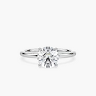 Delicate Four-Prong Round Cut Solitaire Engagement Ring