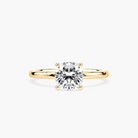 Delicate Four-Prong Cushion Cut Solitaire Engagement Ring