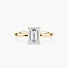 Delicate Four-Prong Emerald Cut Solitaire Engagement Ring