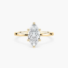 Delicate Four-Prong Marquise Cut Solitaire Engagement Ring