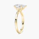 Delicate Four-Prong Pear Shaped Solitaire Engagement Ring