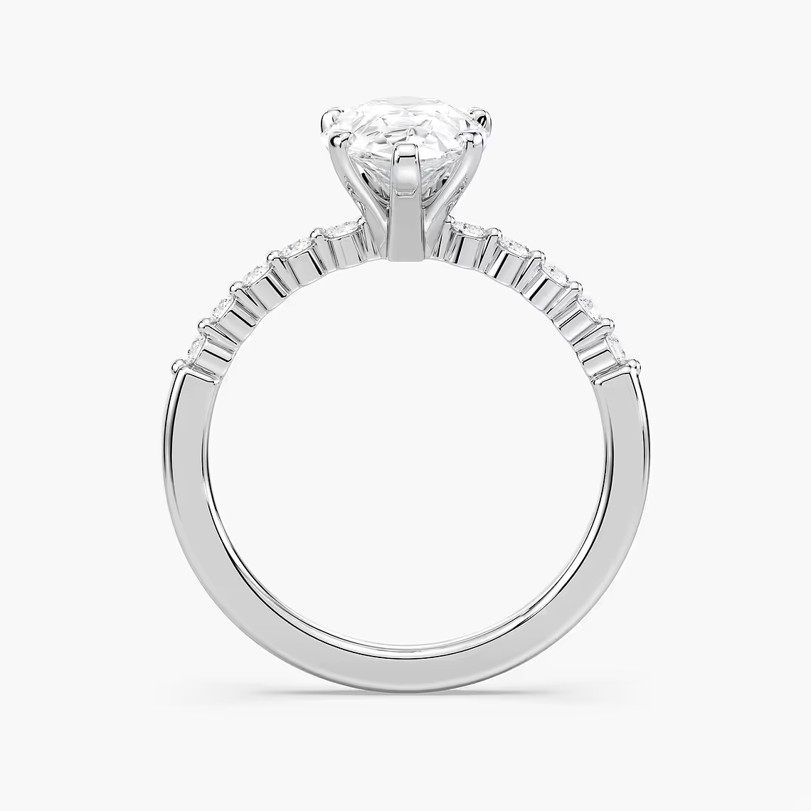 Pear Shaped Shared Prong Side Stone Engagement Ring