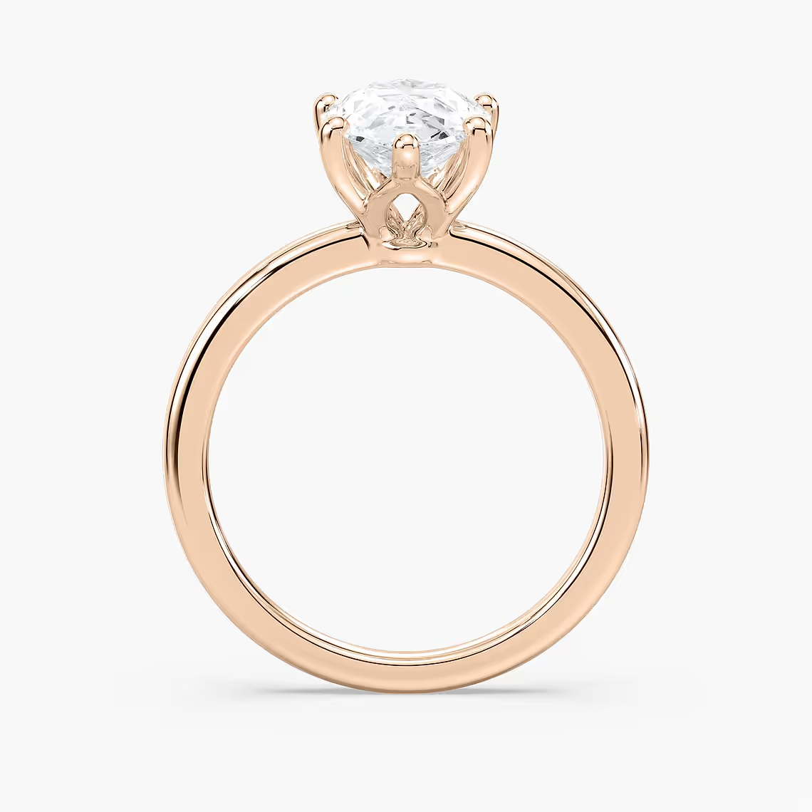 Delicate Four-Prong Pear Shaped Solitaire Engagement Ring
