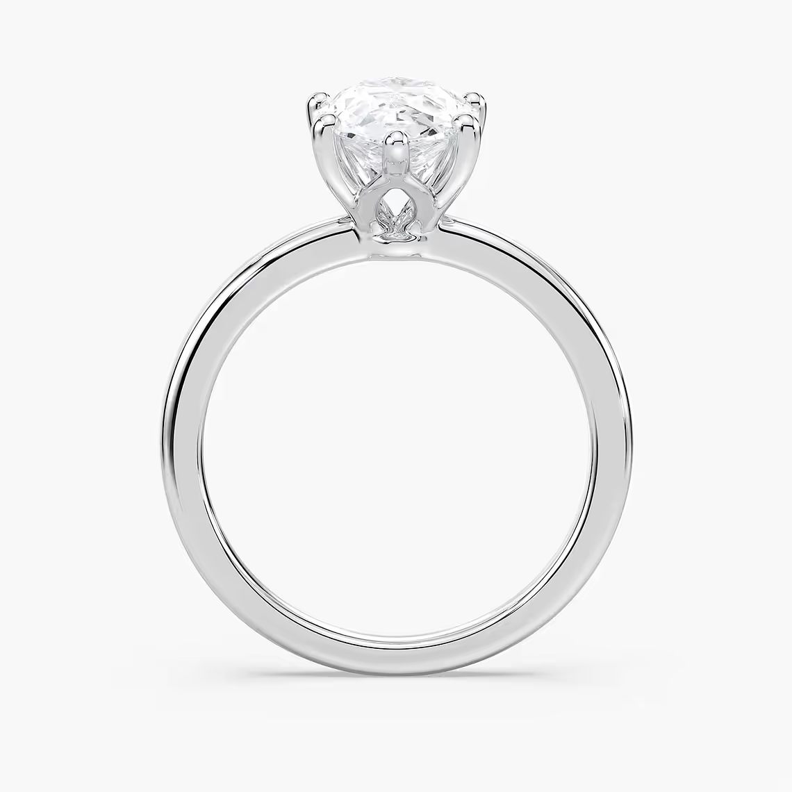 Delicate Four-Prong Pear Shaped Solitaire Engagement Ring