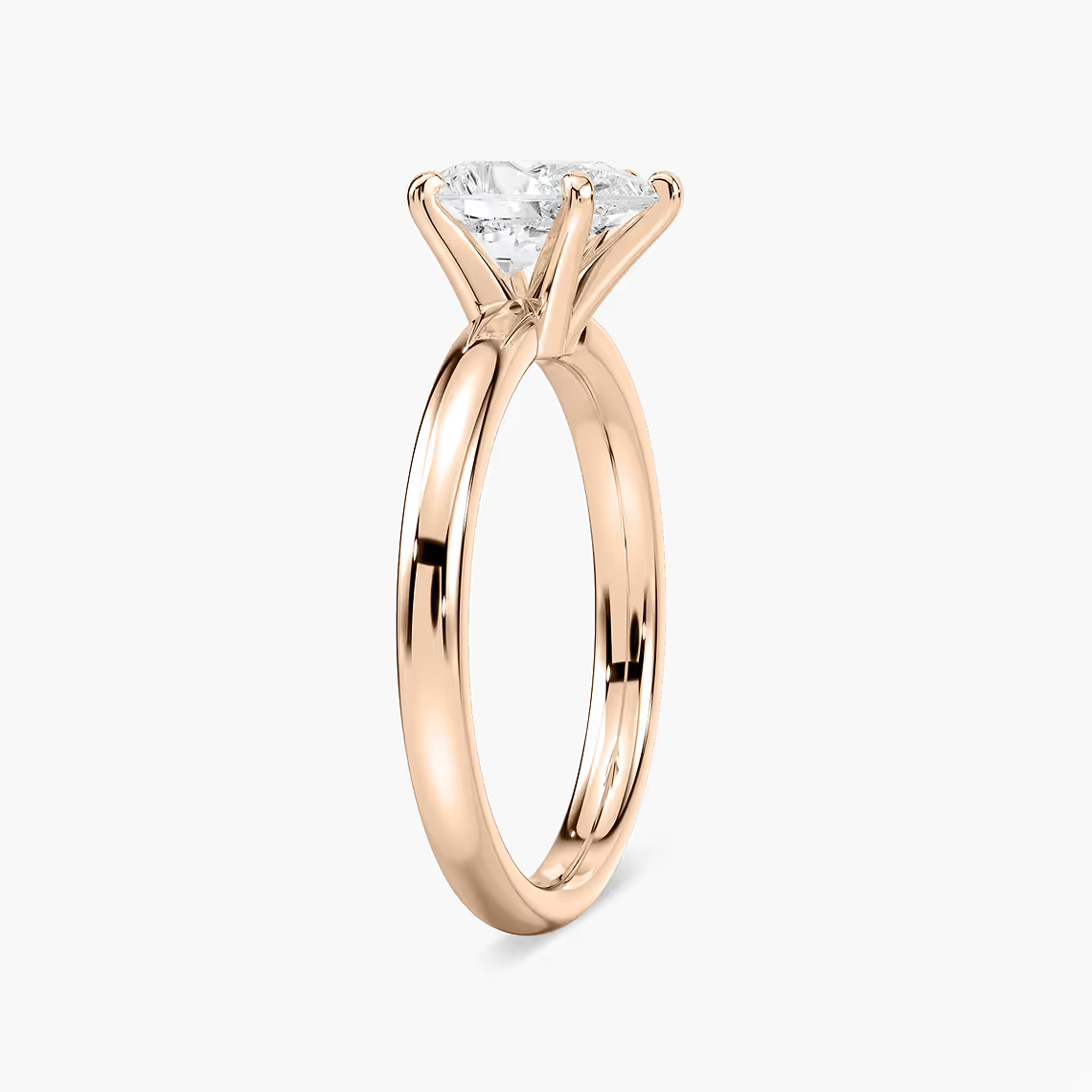 Four-Prong Pear Shaped Solitaire Engagement Ring
